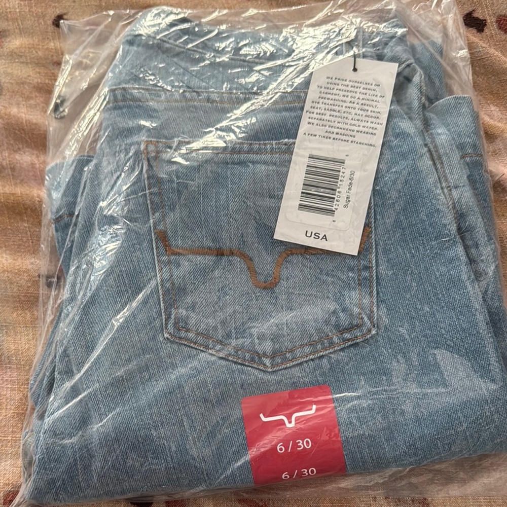 Light Blue Denim Jeans with Back Pocket Detail